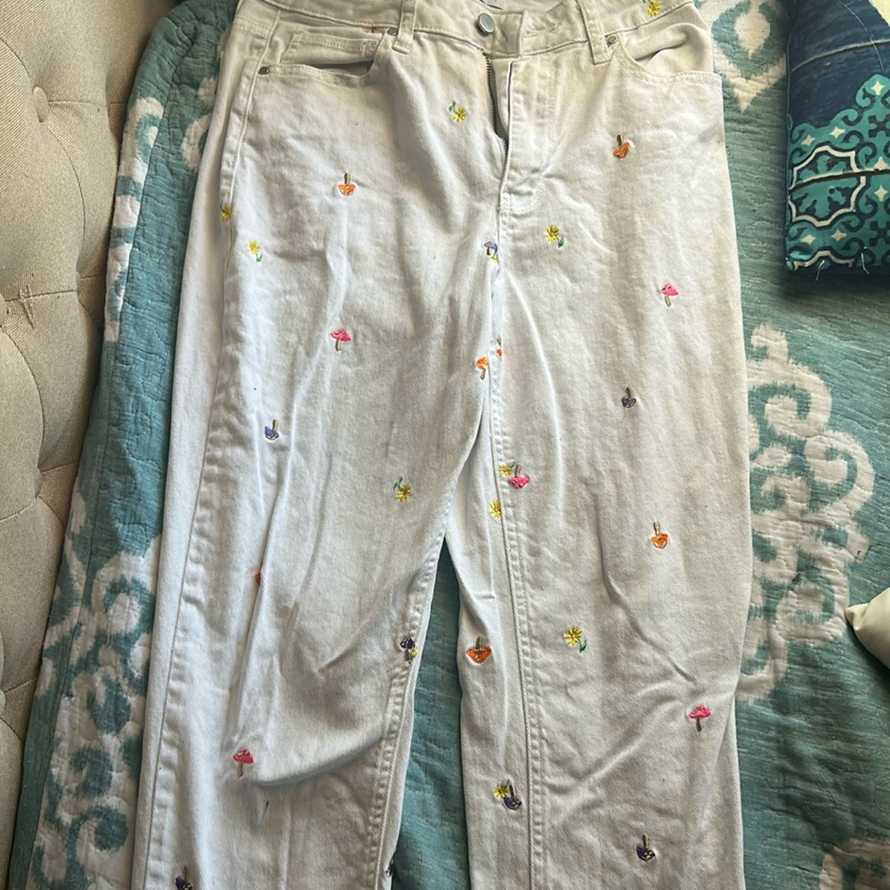 White mushroom and flower jeans